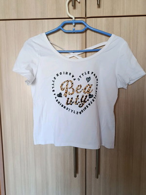 Beauty blouse size S like new, white with pearls and criss-cross back