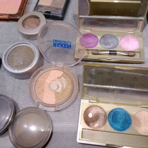 Cosmetics set used with eyeshadows, blushes, lipstick, and lip gloss