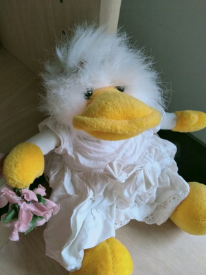 Plush duck with bouquet like new