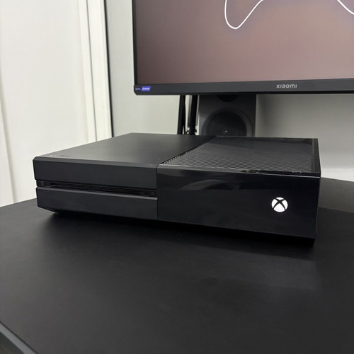 Xbox One 1TB console used with controller and 2 games