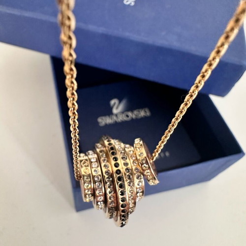 Swarovski Further necklace like new, gold tone with black and clear crystals