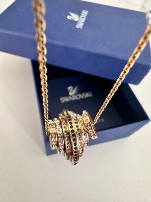 Swarovski Further necklace like new, gold tone with black and clear crystals