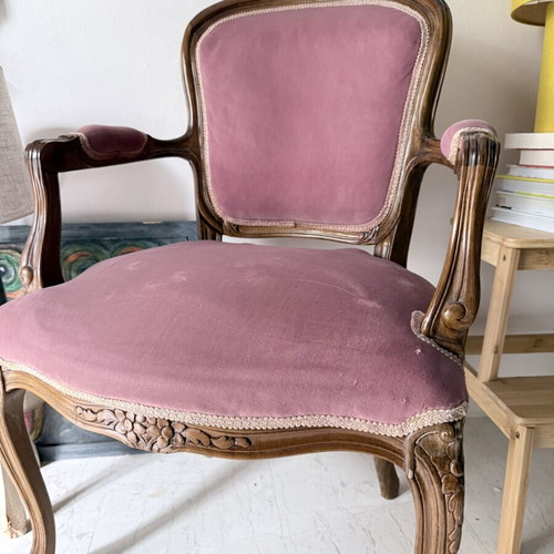 Vintage accent chair with carved wood and pink fabric, like new