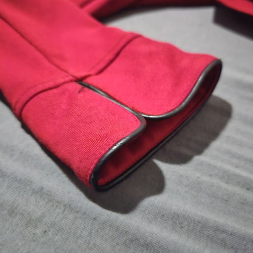 Paranoia red bolero jacket with black details