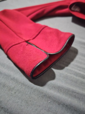 Paranoia red bolero jacket with black details