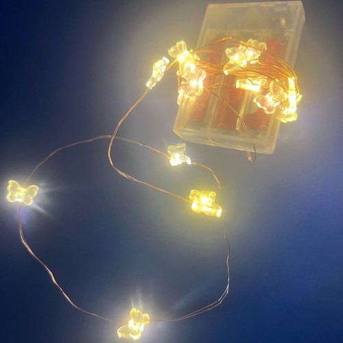 Decorative fairy lights with batteries like new, butterfly shape