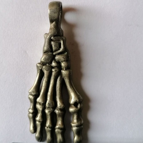 Metal skeleton foot pendant Young Zone new with tribal designs