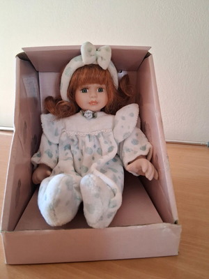 Porcelain doll new, hand-painted, height 20cm