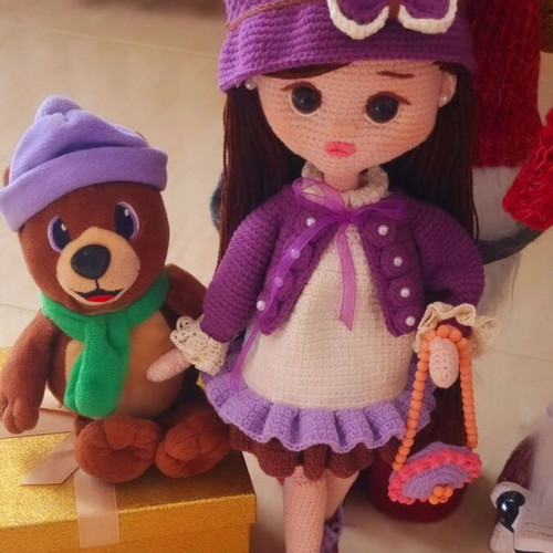 Knitted doll new, handmade