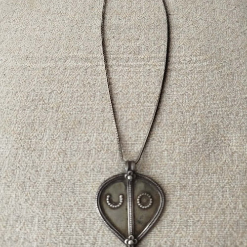 Vintage necklace with 925 silver chain and large ethnic pendant used