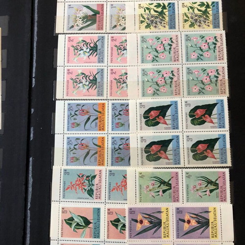 Stamp album with large collection of mint and used blocks worldwide