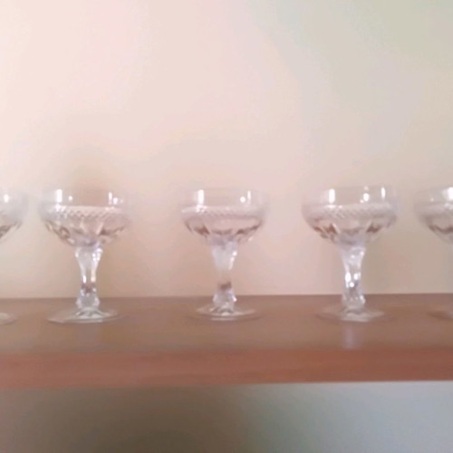 Liqueur glasses used, 4 handmade painted and 5 carved crystal