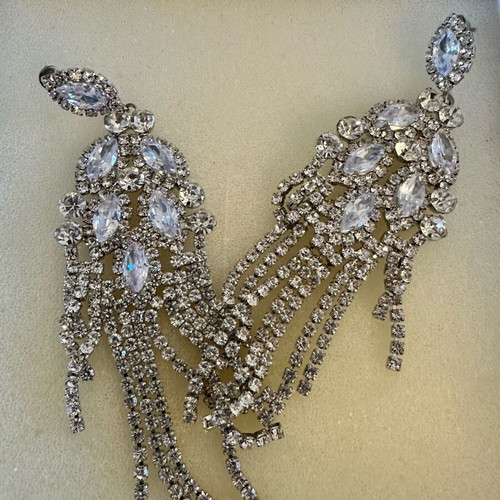 Earrings new with crystals, silver color