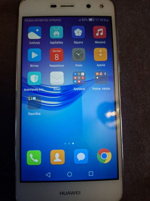 Huawei mobile phone used, white, with headphones and charger