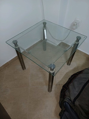 Table made of metal and safety glass like new with modern design
