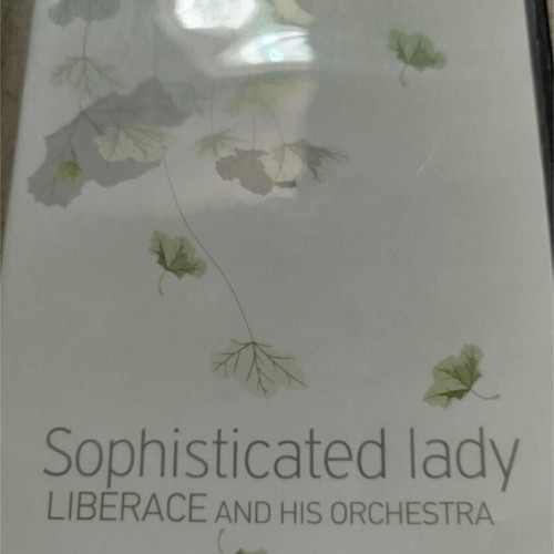 CDs Sophisticated Lady Liberace Orchestra and Carlos Santana like new, foreign music, pack of 2