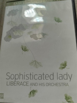 CDs Sophisticated Lady Liberace Orchestra and Carlos Santana like new, foreign music, pack of 2