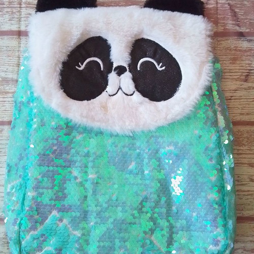 Plush kids backpack panda with sequins used