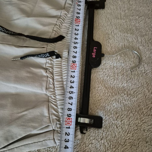 Beige elastic pants size L like new with side pockets and drawstring waist