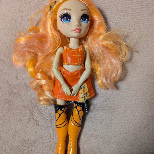 Rainbow High Poppy Rowan Fashion Doll with 2 Mix & Match Outfits, like new