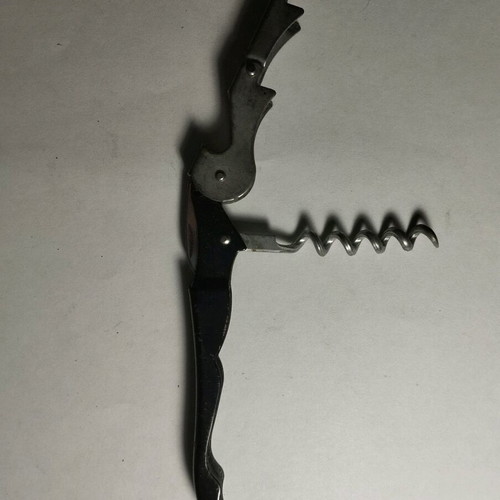 Black bottle opener used for soft drinks and wine