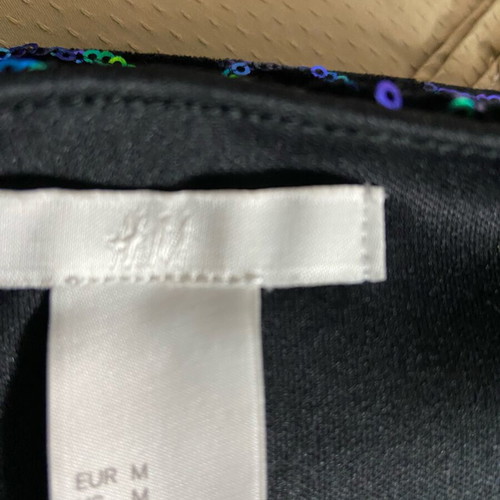 Mini skirt with birds like new, green H&M size M