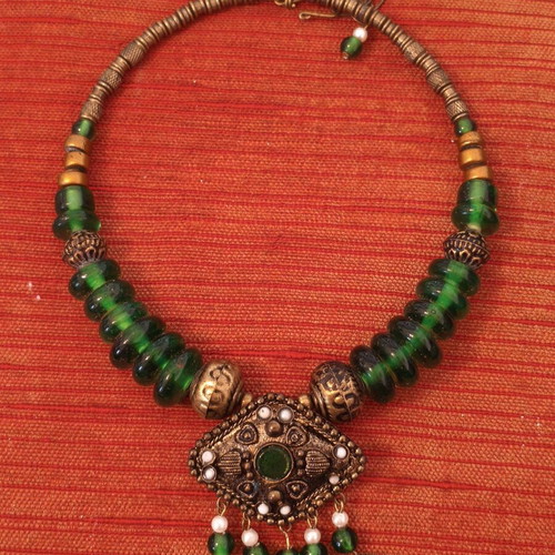 Handmade traditional vintage necklace with green beads and bronze details