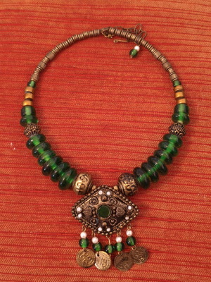 Handmade traditional vintage necklace with green beads and bronze details