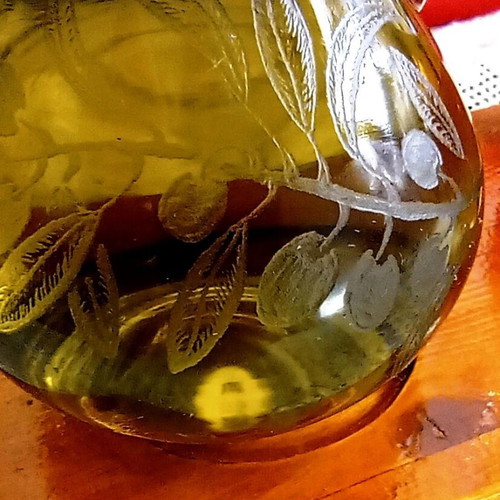 Handmade oil and vinegar set with carved glass bottles and wooden base