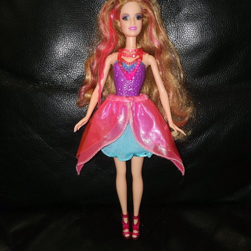 Barbie mermaid doll used with secret door