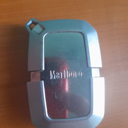 Malboro lighter used, for repair, valve issues