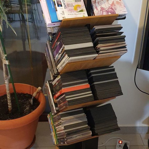 CD/DVD tower used, wooden rotating, black color