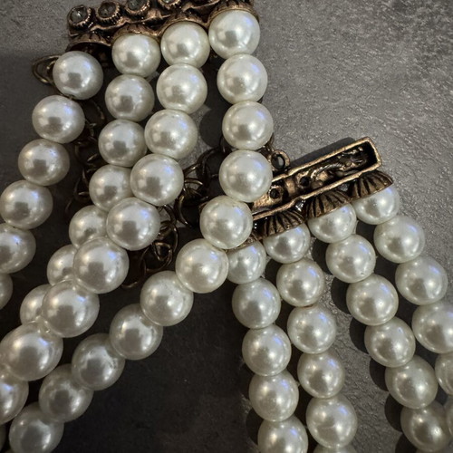 Vintage statement choker with three pearl strands and antique flower