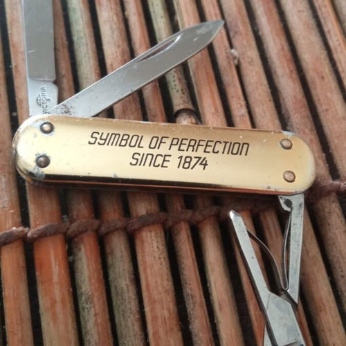 Vintage Piaget Pocket Knife used, advertising