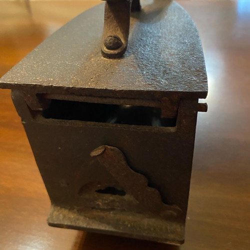 Antique charcoal iron used, cast iron with wooden handle