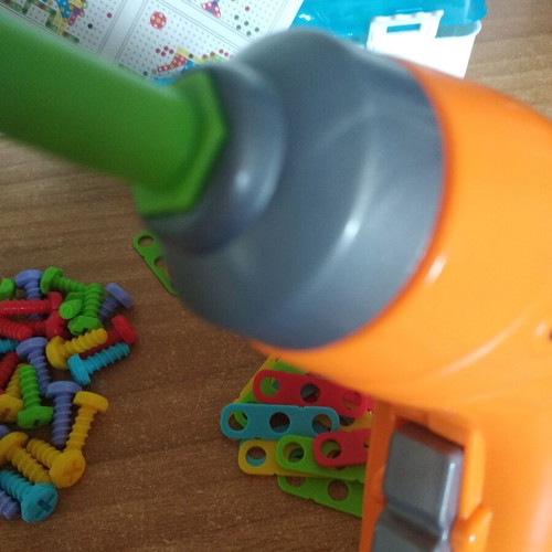 Battery-Powered Screwdriver Toy like new with shapes and screws