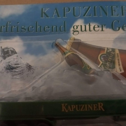 Truck - Articulated lorry in H0 scale - beer advertisement with bottle and ice mountain - Kapuziner
