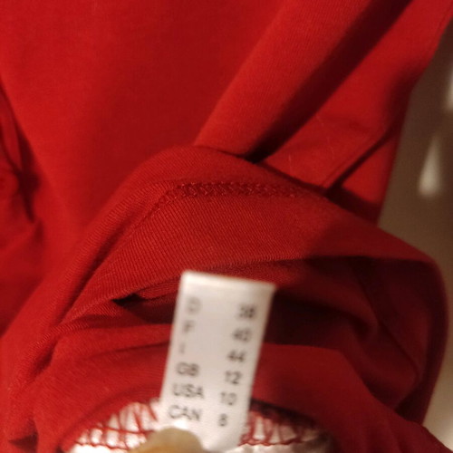 More red elastic blouse with long sleeves and deep neckline new