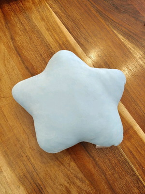 Saint Clair decorative star-shaped pillow used