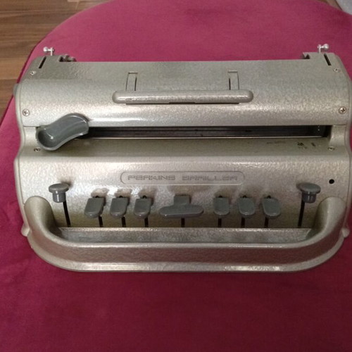 Braille typewriter used with protective cover