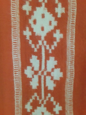 Woven blanket used, 2.06x1.50 m, orange with white pattern