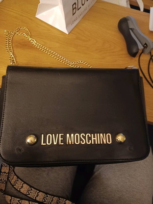 Moschino large shoulder bag used, black with gold details and damages
