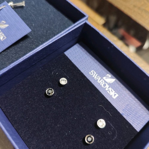 Swarovski earrings 2 sets, like new, black and white