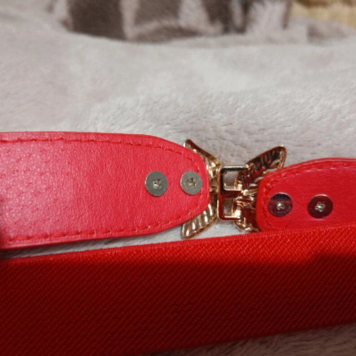 Women's waist belt like new, red with gold leaf buckle