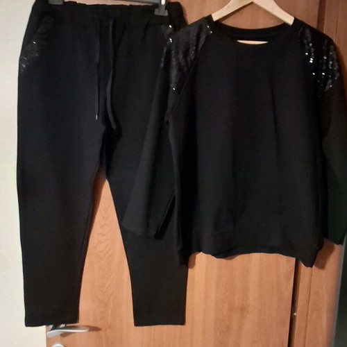 Set with black sequin details like new