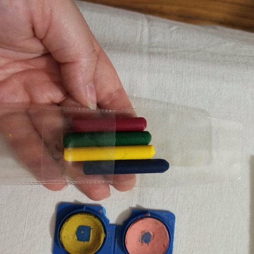 Painting colors used, sets of watercolors and crayons