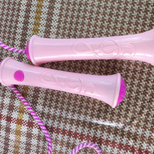 Children's jump rope used, pink with slightly broken handle