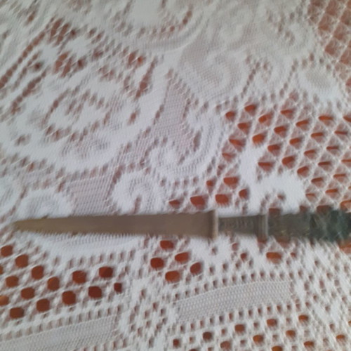 Knossos paper cutter collectible from 1960s used