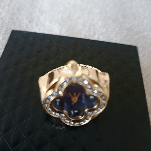 Four-leaf ring like new with quartz watch, blue dial and crystals