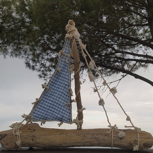 Decorative handmade boat new with driftwood